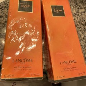 Lancome foaming bath gel and perfume lotion set.